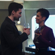 James Holden and Naomi Nagata hold glasses of wine and smile at each other in a scene from The Expanse's fifth season finale.